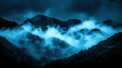 Misty mountain range at night, dark blue tones