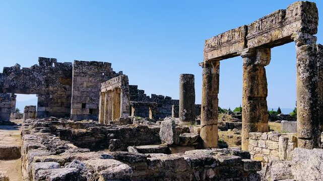 HIERAPOLIS in Denizli, TURKEY, August 13, 2024: The ancient city of Hierapolis near Pamukkale, against the backdrop of nature and mountains. The Phrygian period.UNESCO.4K	