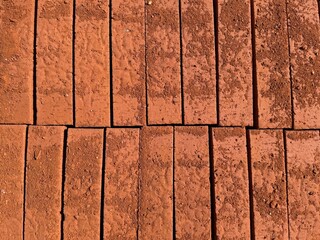 tacked Red Bricks in an Organized Pattern
