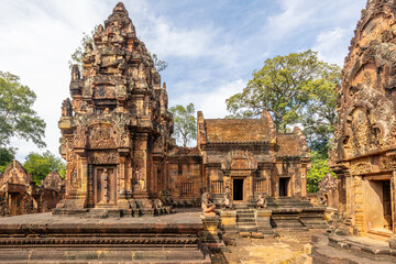 Naklejka premium Inner yard of Banteay Srei khmer hindu temple with statues guarding the entrance to the tomb, Angkor Archaeological Park, Siem Reap, Cambodia