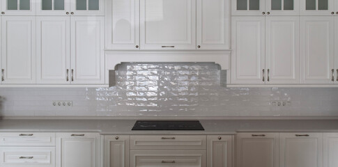 Classic white kitchen with induction hob