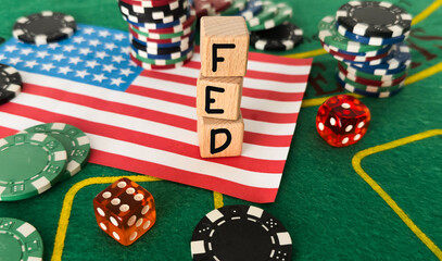 FED wording with down arrow and percentage sign on USD dollar banknote for Federal reserve decrease...
