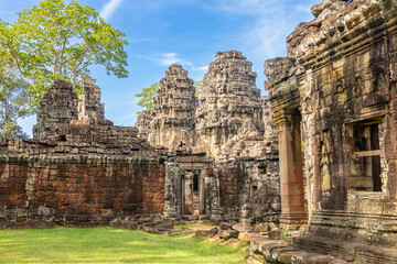 Fototapeta premium Forgotten in jungles ancient ruins of hindu Banteay Kdei khmer ruined temple, Angkor Archaeological Park, Siem Reap, Cambodia