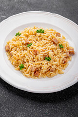 Rice meat ham main course fresh delicious gourmet food background on the table rustic food top view copy space