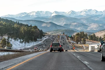 Colorado interstate i70 road in Denver Golden with exit sign and traffic jam from snow capped mountains ski season © Kristina Blokhin