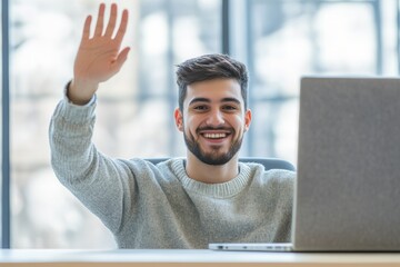 Happy student waves while participating in an online class during daytime from home