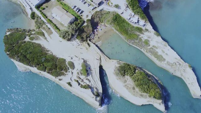 Gorgeous Aerial Drone Shot of a Turquoise Sidari Greece beach with blue green sea and rocks 