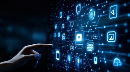 Finger interacting with blue digital interface displaying various application icons on a dark background