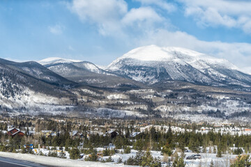 Frisco, Colorado snow capped rocky mountain Buffalo peak and houses buildings in winter weather...