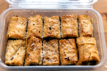 Crnogorska pita dessert box of Montenegro baklava sweet in Balkans from bakery in Podgorica with nuts and fruit filling