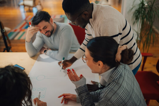 Startup team brainstorming and discussing new project ideas