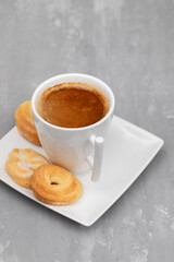 Cup of coffee with buscuits