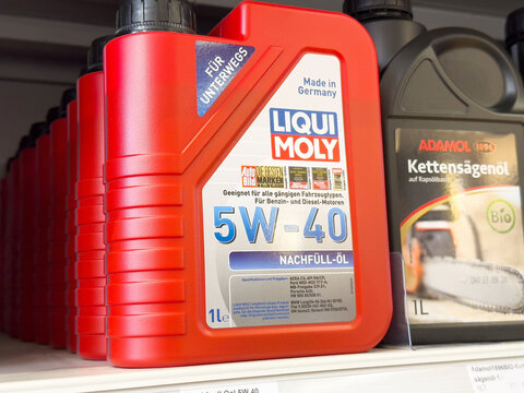 Liqui moly 5w-40 motor oil bottle on store shelf in germany