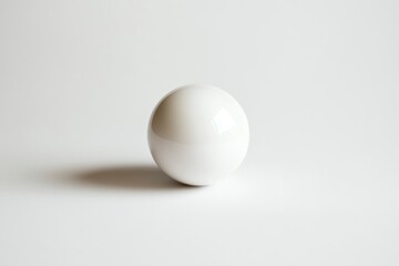 Isolated White Sphere on White Background Providing Sleek Minimalist Aesthetic