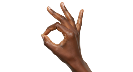 Showing OK sign with dark skin hand isolated on white