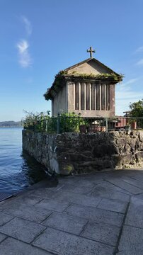 Combarro, horreos and stone crosses overlooking peaceful water in galicia, spain