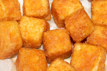 Close up of Square Cooked Crispy Fried Battered Tofu Soy