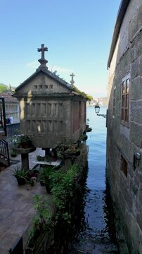 Combarro, horreos and stone crosses overlooking peaceful water in galicia, spain