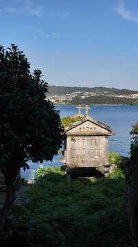 Combarro, horreos and stone crosses overlooking peaceful water in galicia, spain