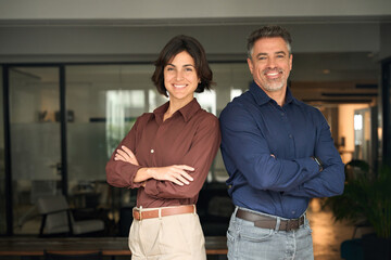 Portrait of happy executive managers, two business man and woman leaders entrepreneurs, corporate...