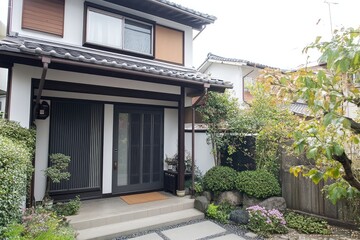 Dark grey aluminum gate with horizontal slats. AI generated illustration.