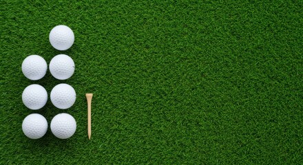 A vibrant green artificial grass surface features six white golf balls arranged in two rows, with a wooden tee placed beside them. Perfect for golf enthusiasts and sports-themed projects.