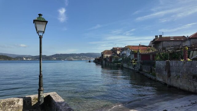 Combarro, horreos and stone crosses overlooking peaceful water in galicia, spain