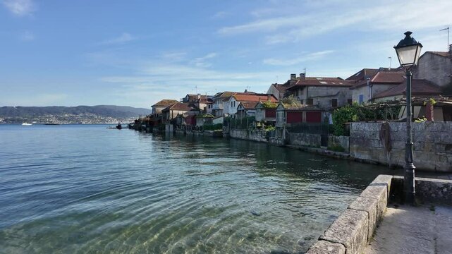 Combarro, horreos and stone crosses overlooking peaceful water in galicia, spain