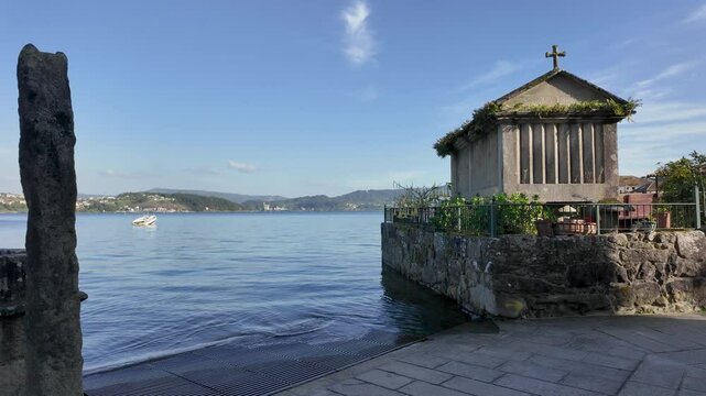 Combarro, horreos and stone crosses overlooking peaceful water in galicia, spain