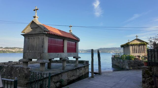 Combarro, horreos and stone crosses overlooking peaceful water in galicia, spain