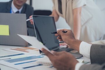 Business Team Discussing Data Analysis at Meeting