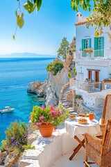 Fototapeta premium A table and chairs on a balcony overlooking the ocean