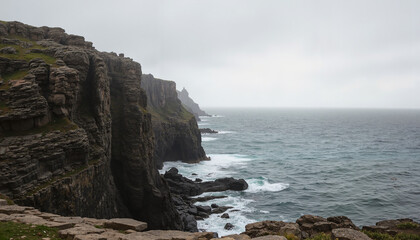Obraz premium Dramatic coastal cliffs overlooking a turbulent sea 