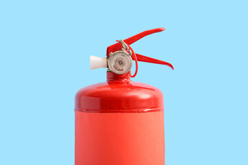 Fire extinguisher on blue background