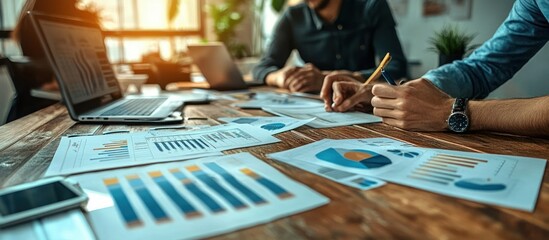 Business Team Collaborating on Project Growth Financial Analysis and Strategy Planning in Modern Meeting