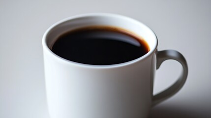 Espresso cup focus in a laid-back business gathering  
