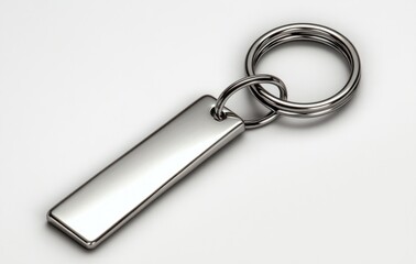 Minimalist Metallic Keychain Close-Up on White Background
