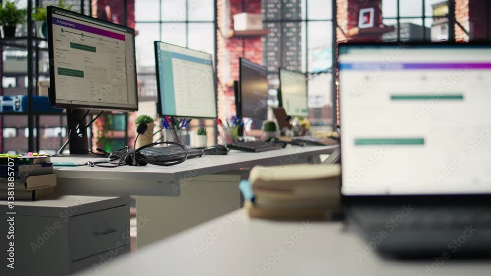 Poster computer monitors on office desk showing data analytics dashboards and performance charts. pc screen