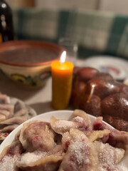 Experience a traditional feast featuring sweet dumplings served in a lovely candlelight ambiance