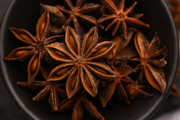 Bowl with aromatic star anise, closeup