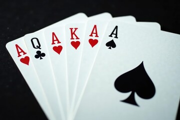 Four aces fanned out, showing card backs and fronts , aces, black, gambling