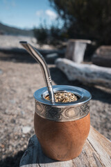 Mate with yerba mate on a beach in Patagonia. A typical hot beverage from Argentina and Uruguay.
