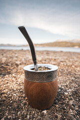 Mate with yerba mate on a beach in Patagonia. A typical hot beverage from Argentina and Uruguay.