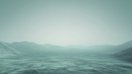 Naklejka premium Misty green landscape of rolling hills under overcast sky
