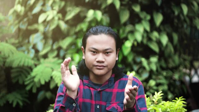 Young Man Clapping With flat expression. Arrogant Young Man Clapping with Attitude. Man Clapping Unenthusiastically