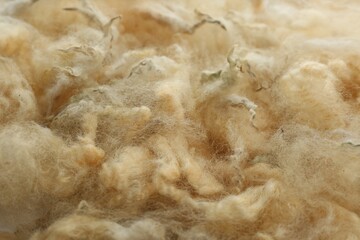 Soft white wool texture as background, closeup