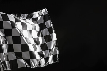 One racing checkered flag on black background, space for text