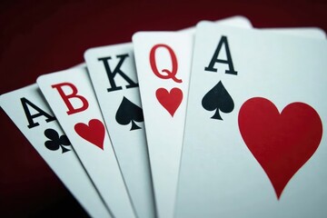 Playing cards arranged in a classic ace high sequence , risk, luck, sequence