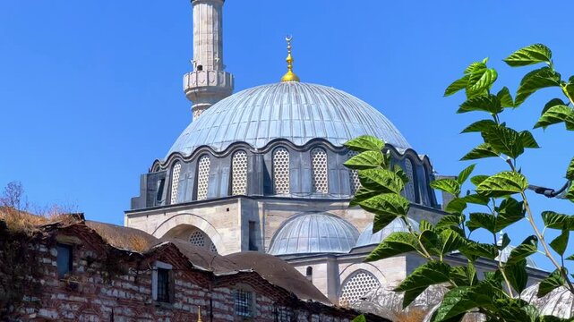 ISTANBUL, TURKEY - AUGUST 8, 2024: Exterior view of the Rustem Pasha Mosque in Eminonu. It was built in 1563 by Mimar Sinan. The mosque of Rustem Pasha, located in Tekirdag. 4K
