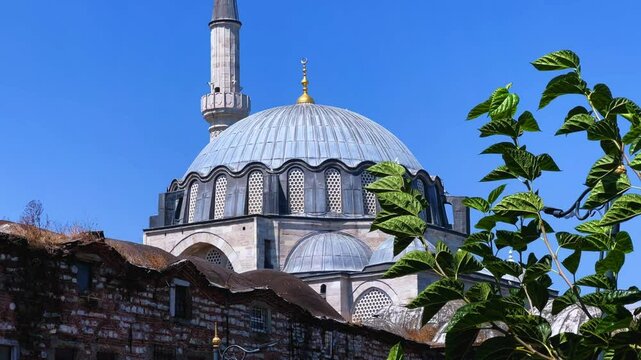 ISTANBUL, TURKEY - AUGUST 8, 2024: Exterior view of the Rustem Pasha Mosque in Eminonu. It was built in 1563 by Mimar Sinan. The mosque of Rustem Pasha, located in Tekirdag. 4K